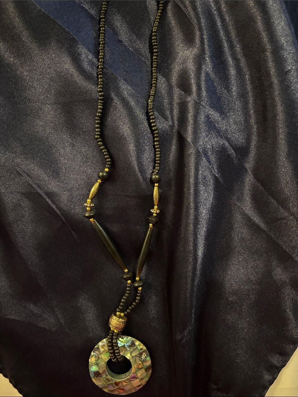 Black Beaded Necklace with Iridescent Abalone Donut Pendant